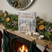Load image into Gallery viewer, Molly &amp; Me Candles 12 Days of Christmas wax melt advent calendar beside a white ceramic Christmas tree wax burner and soy wax melts